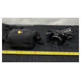 FujiFilm FinePix S8650 camera and case.