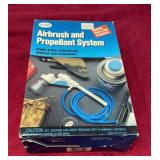 Hairbrush and propellant system