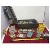 Toolbox filled with screws, nails, stainless