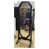 Black tall mirror on stand measures 24 inches
