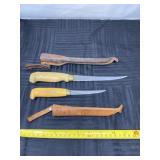 Filet knives with sheaths.
