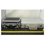 Two aluminum gun cases