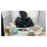 NRA bag with earplugs, screwdriver, tools,