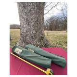 Two folding armchairs witu cases.