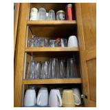 Contents only of all glasses and cups on shelves