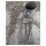 Trap stakes and bucket.