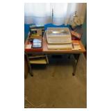 Office table on wheels of brother typewriter