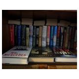 All books on shelf including Stephen King books.