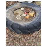 Tractor tire used as a sand box. It will have to