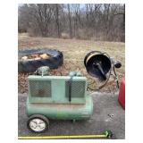 SpeedAire air compressor with hose reel.