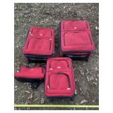 Four piece Pierre Cardin two wheel luggage set.