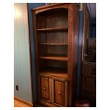 Wood book shelf and bottom storage area measures