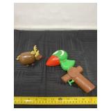 Reindeer candy dispenser and bird tweet toy.