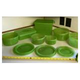 Green storage containers with lids.