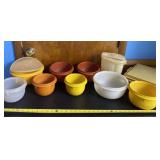 Tupperware bowls,  pitcher and cake pan
