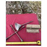 Funnel, tire changer and railroad rail.