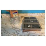 register covers and a polished brass light