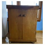 Rolling butcher block top with slide out cutting