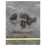 Four Victor traps and stakes.