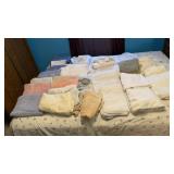 Large lot of bath towels, some dish cloth bedding