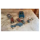 Old cars, including cast-iron toy cars, and a