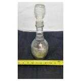 Wine decanter of mostly dimes