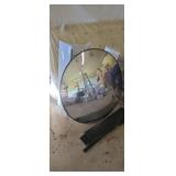 black-framed round mirror. 36"
