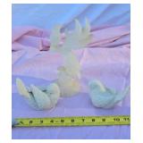 Stone caved birds, ceramic birds