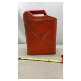USMC red metal jerry can, a type of robust liquid