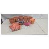 Terracotta pots, imitation flowers