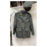 US Army green dress uniform jacket and cap.