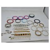 Gold silver tone and plastic bracelets