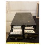 Steel case with cassettes.