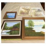 Framed oil paintings and barn scene pictures.