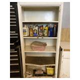 Metal cabinet with contents in it.