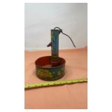 Ohio Art tin lithograph water pump sand toy.