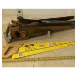 Cross cut saws new and used with saw holder.