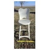 Vintage steel industrial bar stool in a cream