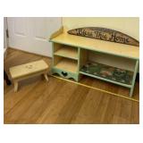 Bless This Home sign, small bench and wood shelf
