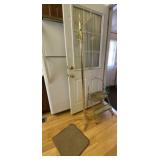 Rug, step stool and coat rack.