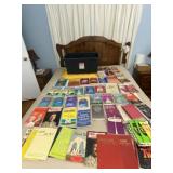 Books of gospel hymns with tote and lid.