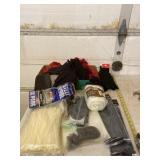 Gloves, zip ties, steel wool and drip cloth.