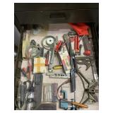 Oil filter wrench, testers, stapler, small vice