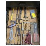 Saw, tin snips and more.