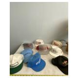 Various company hats.