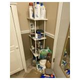 Wood shelf with all contents on shelf and floor.