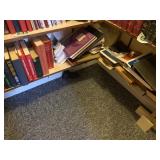 Bottom two shelves of Ministry, encyclopedias and