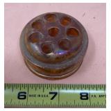 Carnival glass flower frog.