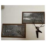 Framed elk pictures and wall hanging decor.