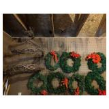 7 wreaths and inter wind grapevines made into a